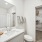 bathroom with a large mirror